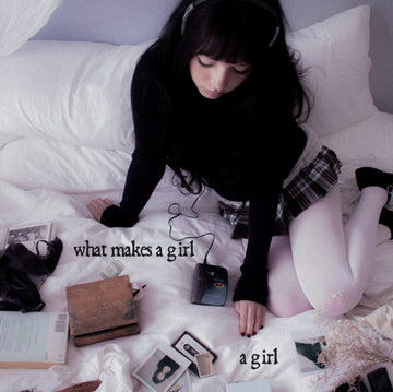 WHAT MAKES A GIRL A GIRL | VINYL RECORD (LP)