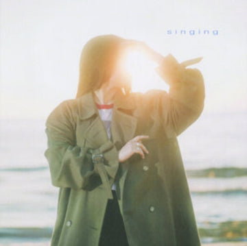 SINGING (SUNSHINE VINYL) | VINYL RECORD (LP)